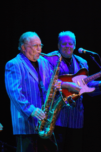 Joey Ambrose, one of Bill Haley's Original Comets plays his sax , Next to him is Jackson Haney who is now known as "Baby Comet"